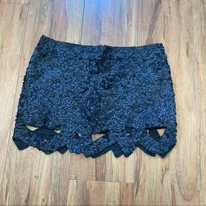 Aje. Black sequin catara mini skirt